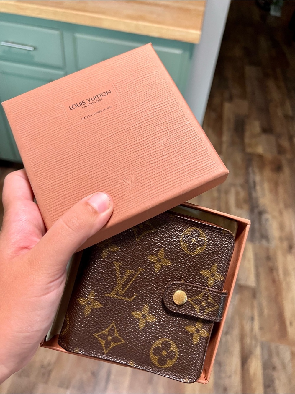 Louis Vuitton Compact Zippy with original box and tags.